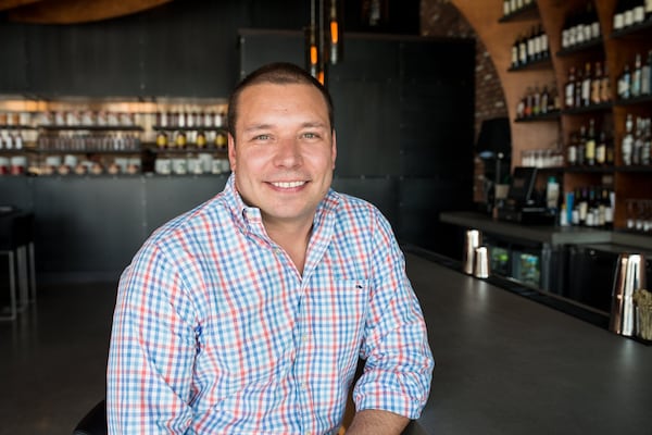  Owner Greg Bauer at the bar at CO in Atlanta. Photo credit- Mia Yakel.