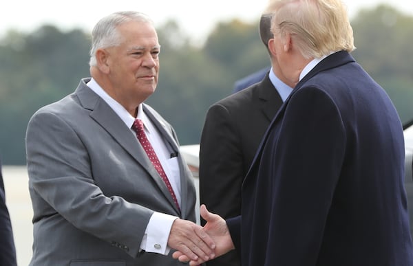 Speaker of the Georgia House of Representatives David Ralston greets President Donald Trump as he arrives at Dobbins Air Force Base on Friday, November 8, 2019, in Marietta, Ga. Curtis Compton/ccompton@ajc.com