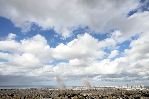 Smoke rises after an Israeli airstrike on Dahiyeh, in the southern suburb of Beirut, Lebanon, Monday, Nov. 25, 2024. (AP Photo/Bilal Hussein)