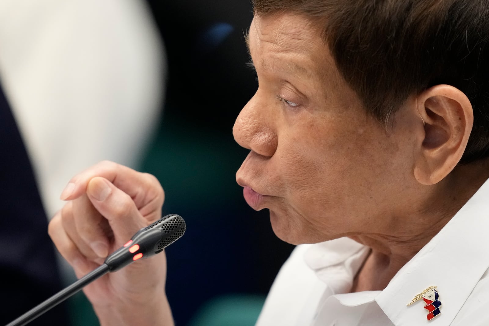 Former Philippine President Rodrigo Duterte speaks during a senate inquiry on the so-called war on drugs during his administration at the Philippine Senate Monday, Oct. 28, 2024, in Manila, Philippines. (AP Photo/Aaron Favila)