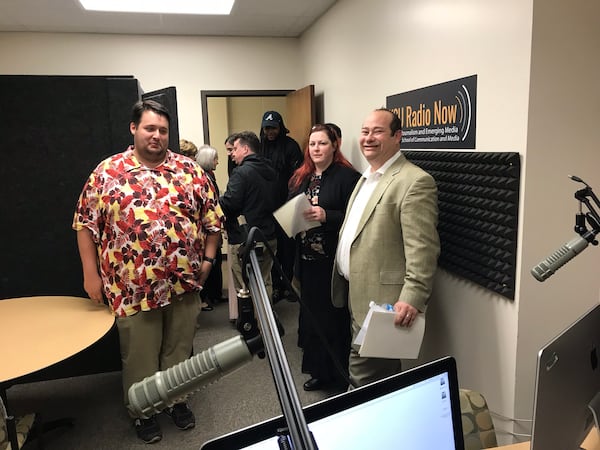  Former students of Rhubarb Jones Scott Bagwill (left) and Ellen Eldridge (center) plus instructor Josh Azriel at the Rhubarb Jones Radio Learning Lab. CREDIT: Rodney Ho/rho@ajc.com