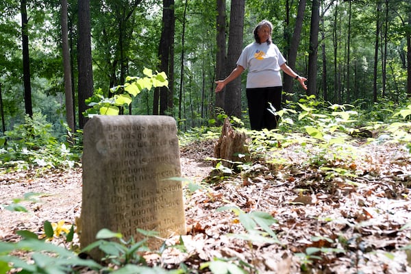 Francine Wilkins has many of her relatives back to her great, great grandfather buried in the Old Ebenezer Cemetery in Marietta. She is working to restore the cemetery, which has been neglected over the years and only has one intact headstone still standing. Photographed on Friday, July 14, 2023. (Ben Gray / Ben@BenGray.com)