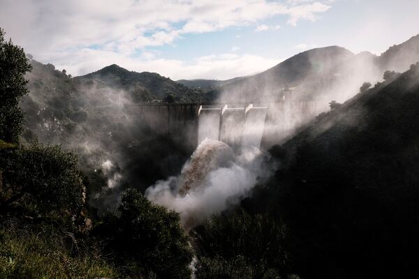 Water is released from the dam of Casasola in Malaga, Spain, Tuesday, March 18, 2025. (AP Photo/Gregorio Marrero)