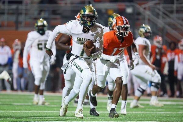 Grayson quarterback Jeff Davis (7) runs for a touchdown during the second half against Parkview at Parkview High School, Friday, November 3, 2023, in Lilburn, Ga. Grayson won 41-14. The loss knocked Parkview out of the Class 7A top 10. (Jason Getz / Jason.Getz@ajc.com)