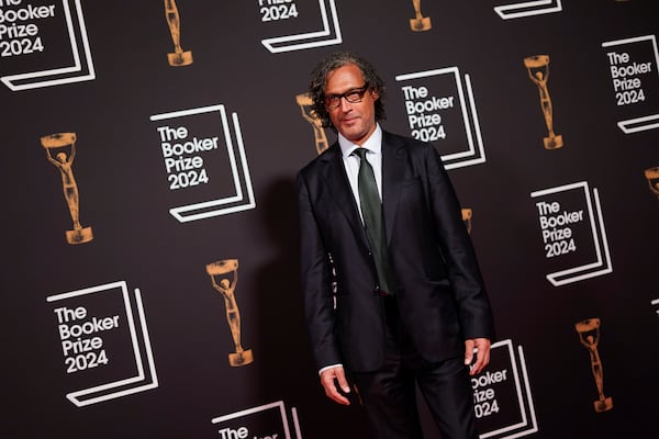 David Olusoga arrives at the Booker Prize award dinner in London, Tuesday, Nov. 12, 2024. (AP Photo/Alberto Pezzali)