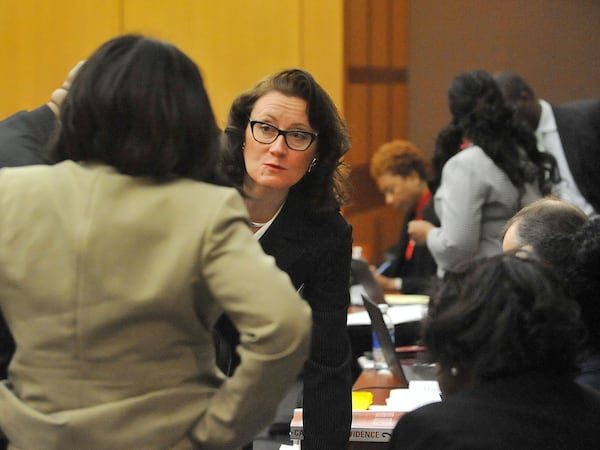 Veteran prosecutor Linda Dunikoski (center) has been hired by the office of the Augusta Judicial Circuit District Attorney.