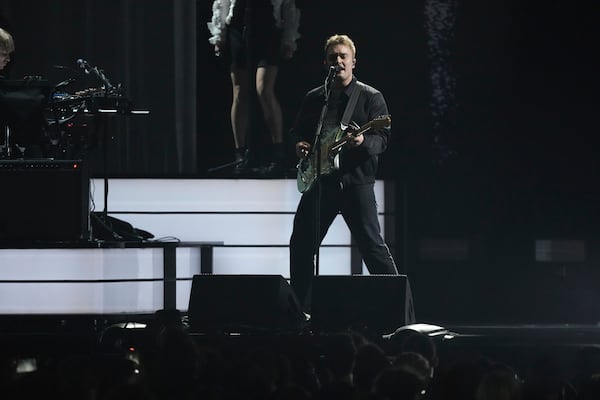 Sam Fender performs during the Brit Awards 2025 in London, Saturday, March.1, 2025. (Photo by Scott A Garfitt/Invision/AP)