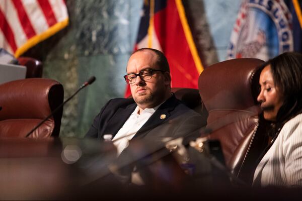 District 9 council member Dustin Hillis listens to public comment during the Atlanta City County FEC committee meeting on Wednesday, May 24, 2023, at City Hall in Atlanta.  Council members voted to approve funding for the new Atlanta police training center also known as Cop City. CHRISTiNA MATACOTTA FOR THE ATLANTA JOURNAL-CONSTITUTION.