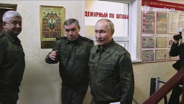 In this image made from video released by the Russian Presidential Press Service, on Wednesday, March 12, 2025, Russian President Vladimir Putin, right, accompanied by Russian Chief of General Staff Gen. Valery Gerasimov, second left, visits military headquarters in the Kursk region of Russia. (Russian Presidential Press Service via AP)