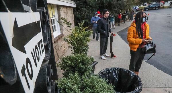 Voters lined up to vote at Park Tavern in Atlanta on Tuesday, Nov. 3, 2020. (John Spink / John.Spink@ajc.com)

