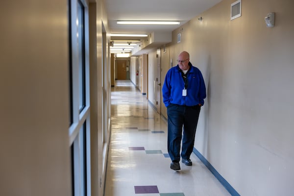 Tim Dimond, deputy director of the Fulton County Department of Real Estate and Asset Management, walks through the Fulton County Oak Hill Child, Adolescent & Family Center in Atlanta on Friday, February 10, 2023. The complex will become home to a county behavioral crisis center. (Arvin Temkar / arvin.temkar@ajc.com)