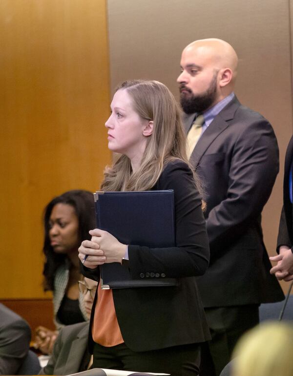 Senior Assistant Attorney General Blair McGowan, left, and defense attorney Scott Grubman listen to Judge Jane Morrison during a pre-trial hearing Monday in the case of Jenna Garland. Garland, a former press secretary to former Atlanta Mayor Kasim Reed, has been charged with two misdemeanor counts of violating the Georgia Open Records Act. STEVE SCHAEFER / SPECIAL TO THE AJC