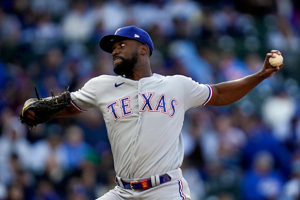 Texas Rangers relief pitcher Taylor Hearn throws during the seventh inning of a baseball game against the Chicago Cubs Saturday, April 8, 2023, in Chicago. (AP Photo/Erin Hooley)