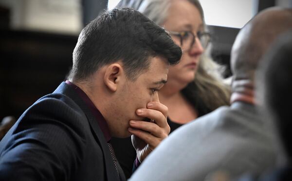 Kyle Rittenhouse puts his hand over his face as he is found not guilty on all counts at the Kenosha County Courthouse on Nov. 19, 2021, in Kenosha, Wisconsin. Rittenhouse was found not guilty of all charges in the shooting of three demonstrators, two of whom died.