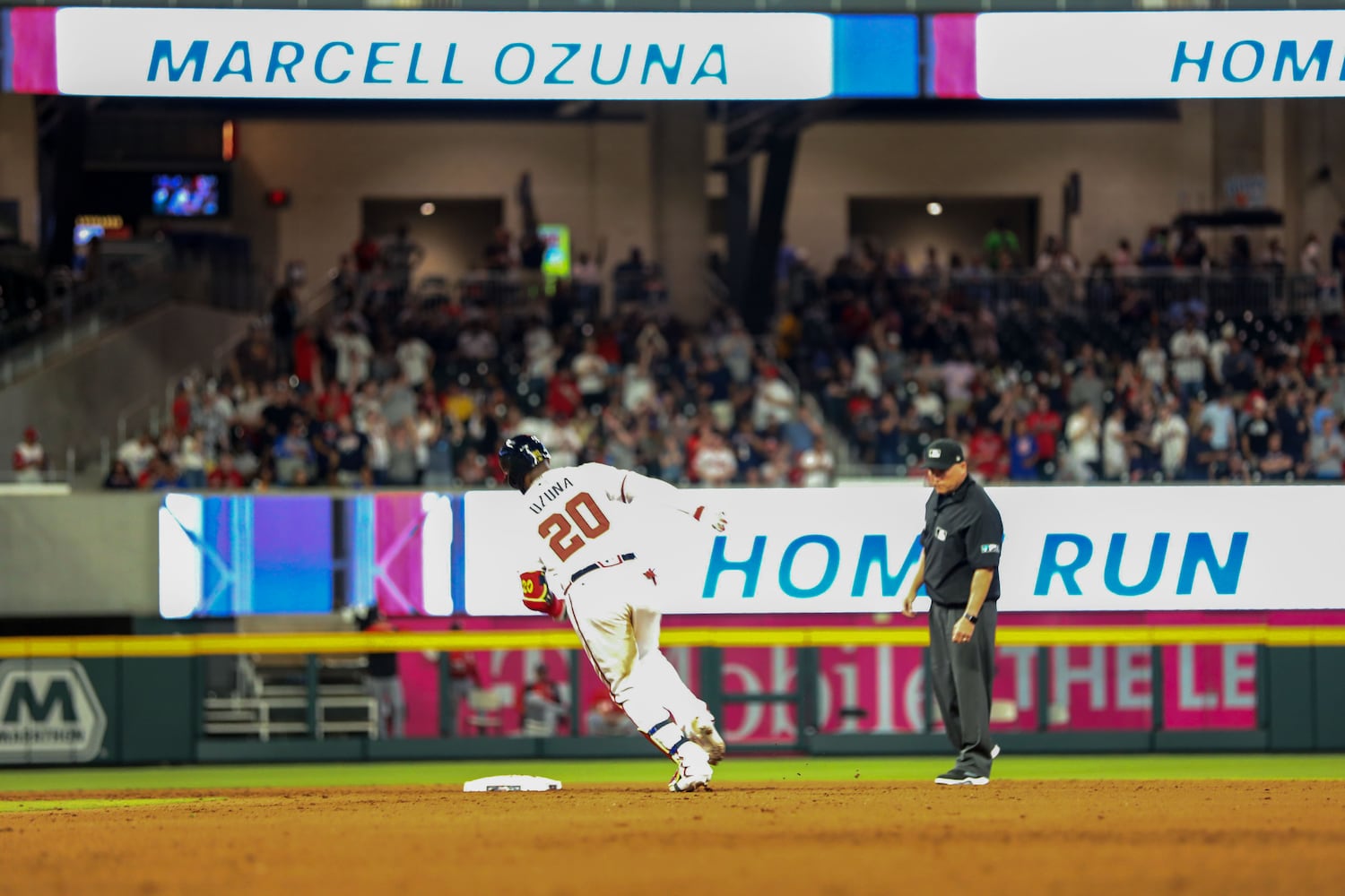 Atlanta Braves left fielder Marcell Ozuna (20) crosses second base after hitting his second solo home run during the 5th inning at Truist Park on Tuesday, April 12, 2022. Miguel Martinez/miguel.martinezjimenez@ajc.com