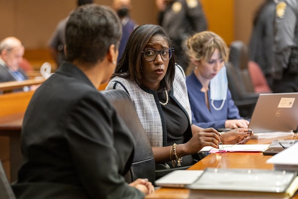 Deputy district attorney Simone Hylton (center) appears at a hearing for the YSL RICO case at the Fulton County Courthouse in Atlanta on Thursday, December 15, 2022. Hylton read Wunnie Lee's negotiate guilty plea agreement on Friday. (Arvin Temkar / arvin.temkar@ajc.com)