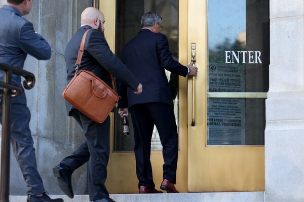 060222 Atlanta: Georgia Secretary of State Brad Raffensperger enters the Fulton County Courthouse to testify to a grand jury involving the probe into whether former President Donald Trump and others tried to improperly overturn the 2020 election Thursday, June 2, 2022, in Atlanta. (Jason Getz / Jason.Getz@ajc.com)