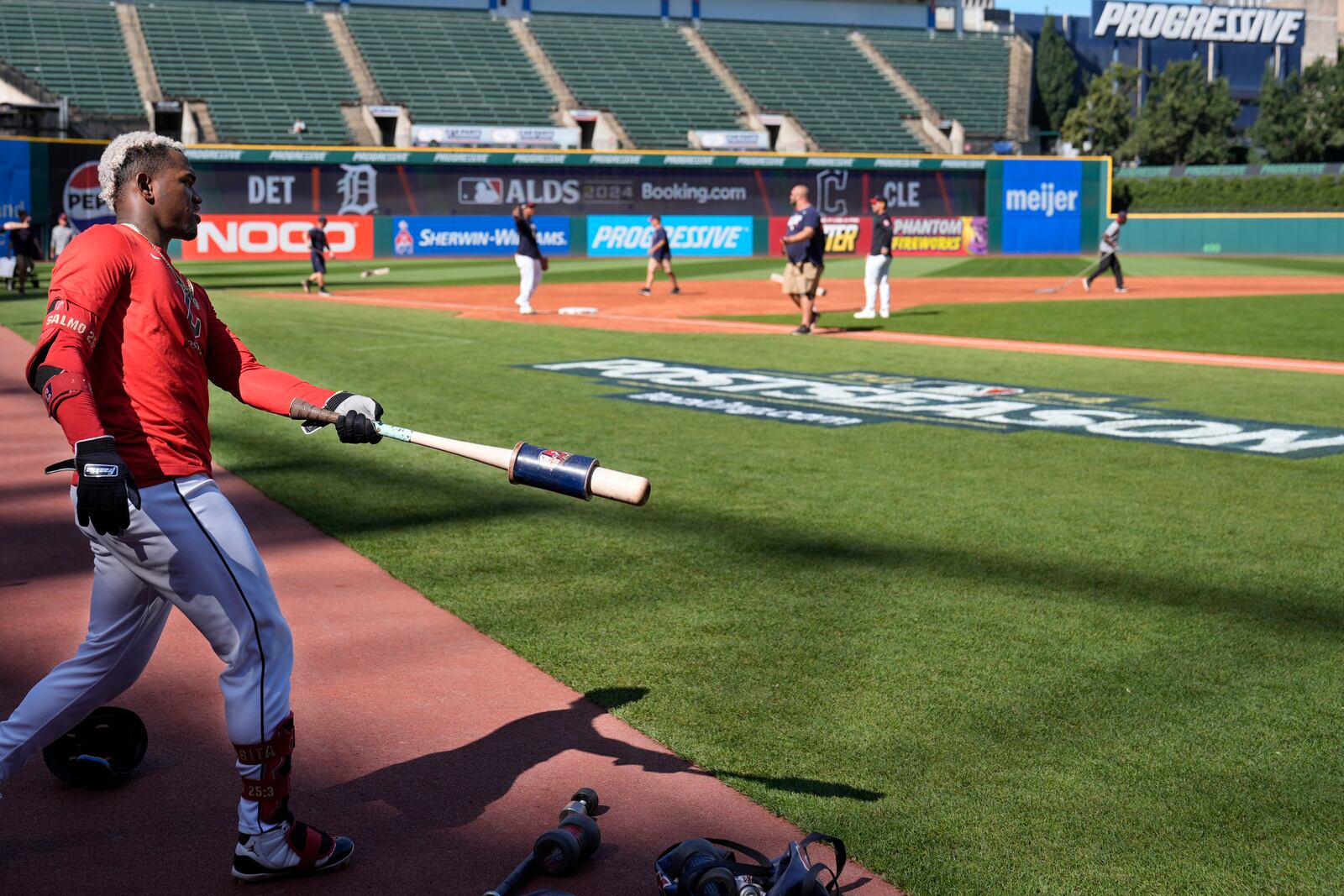 Cleveland Guardians' Angel Martínez warms up before a simulated game during a baseball workout in Cleveland, Thursday, Oct. 3, 2024, in preparation for the American League Division Series. (AP Photo/Sue Ogrocki)