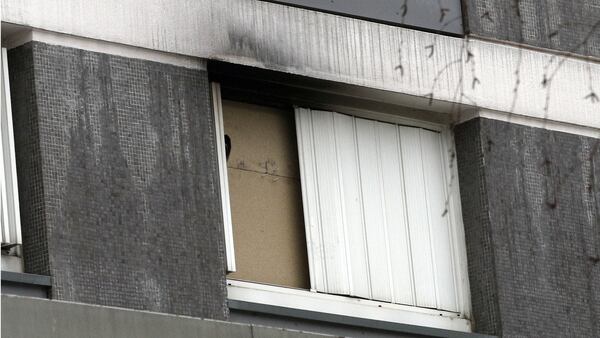 Smoke damage can be seen above a window of the Paris apartment of Mireille Knoll, 85, who was found stabbed to death Friday, March 23, 2018, by firefighters responding to a call. Two men have been arrested on charges they killed Knoll because she was Jewish, then set her apartment on fire.