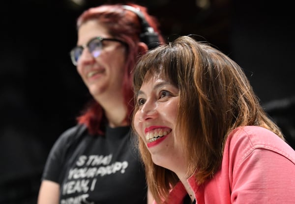 Megan Tabaque (foreground), playwright and director, smiles as she directs during a rehearsal at Mary Gray Munroe Theater, Friday, March 31, 2023, in Atlanta. Megan Tabaque, a playwriting fellow at Emory University, is the creator and director behind a new play “Britney Approximately: A Pop Greek Tragedy,” which will be at the Mary Gray Munroe Theater at Emory University from April 6 to 16. (Hyosub Shin / Hyosub.Shin@ajc.com)