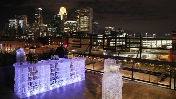 Bartender Nick Kosevich mans the ice bar on Hewing Hotel&apos;s rooftop on Dec. 22, 2017 in Minneapolis. (Anthony Souffle/Minneapolis Star Tribune/TNS)