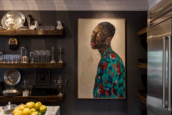 One of the works in Arthur Lewis's personal collection is Ghanaian artist Amoako Boafo's "Boy with Flower Earring" (2019). 
(Courtesy of Jeff McLane)