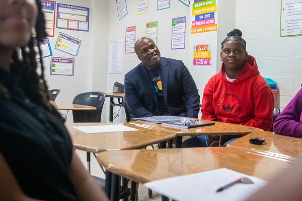 Superintendent Bryan Johnson (left) participates in class along with students at the Sylvan Hills Middle School’s first day of class in Atlanta on Thursday, Aug. 1, 2024.  (Ziyu Julian Zhu / AJC)