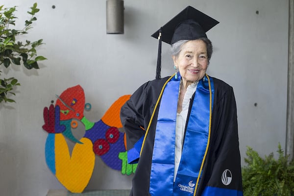 Joyce Lowenstein, 93, poses for a portrait at her Midtown Atlanta residence a few days ahead of her graduation from Georgia State University. 