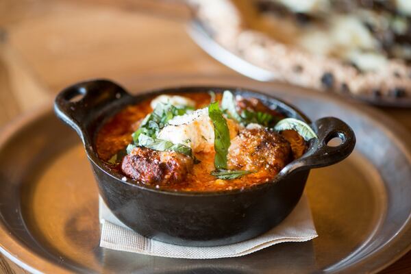 Ammazza Decatur Polpette, house made meatballs with house tomato sauce, romano, mozzarella, and ricotta cheese. Photo credit- Mia Yakel.