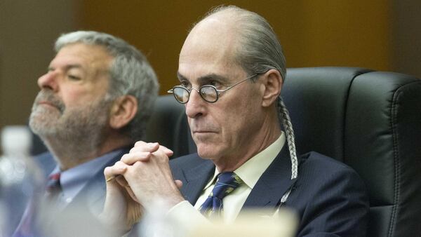 Defense attorneys Bruce Harvey (right) and Don Samuel listen to testimony during the murder trial against Claude "Tex" McIver in March 2018. ALYSSA POINTER/ALYSSA.POINTER@AJC.COM