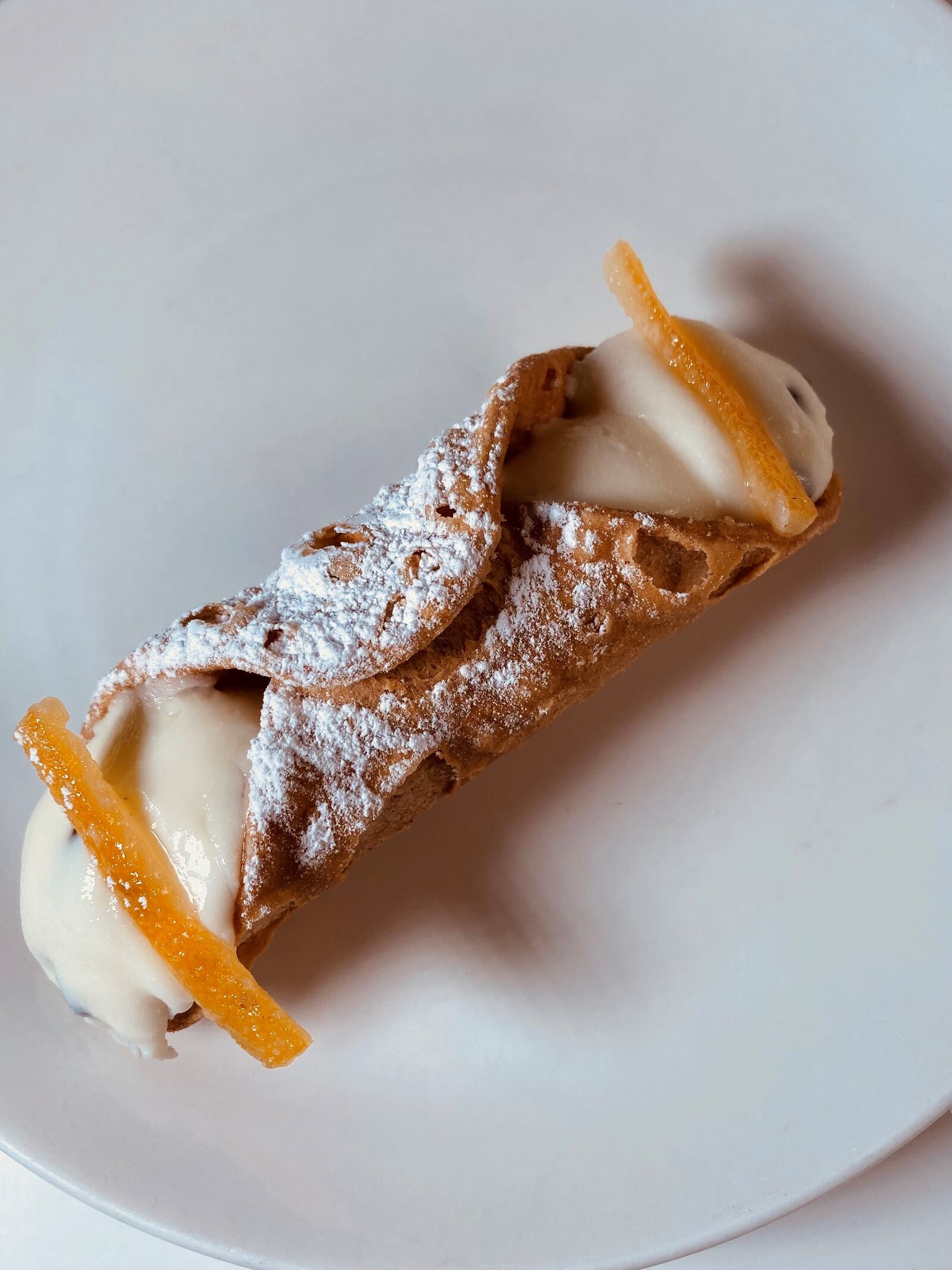 Creamy cannoli are on the dessert menu at Amalfi Pizza, along with tiramisu. Bob Townsend for The Atlanta Journal-Constitution
