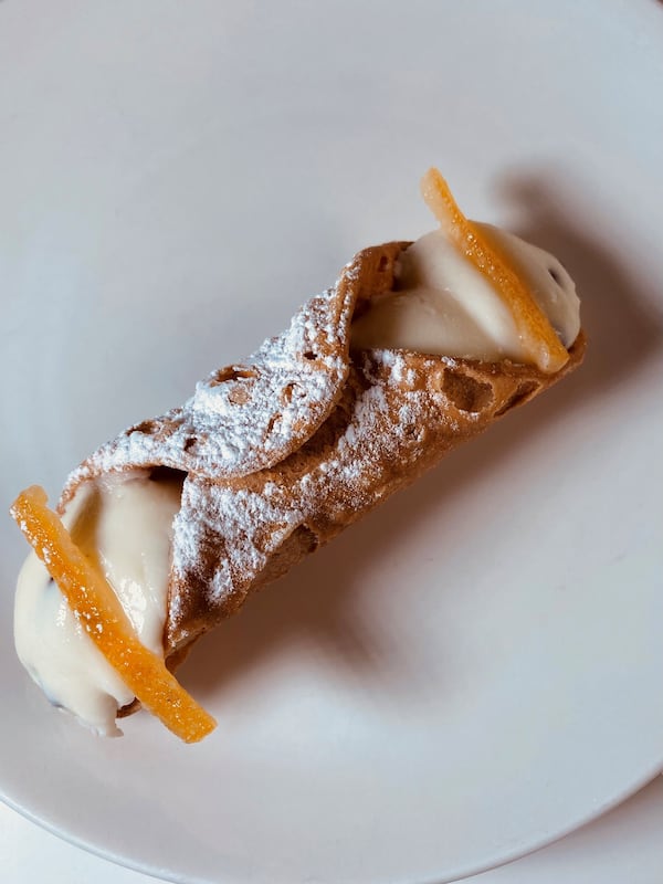 Creamy cannoli are on the dessert menu at Amalfi Pizza, along with tiramisu. Bob Townsend for The Atlanta Journal-Constitution
