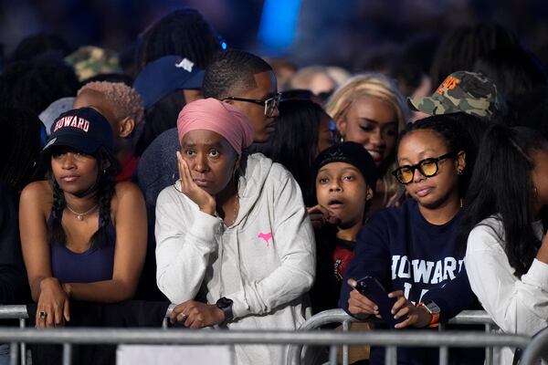 Supporters of Vice President Kamala Harris look gloomy as election results come in during a watch party at Howard University in Washington. 