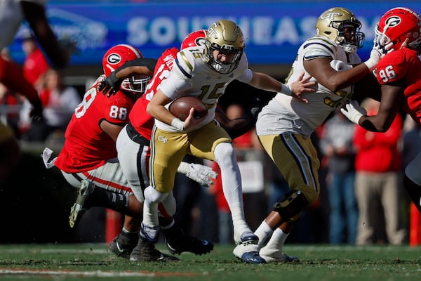 Georgia Tech Yellow Jackets quarterback Zach Gibson (15) runs the ball against the Georgia Bulldogs at Sanford Stadium, Saturday, November 26, 2022, in Athens, Ga. Jason Getz / Jason.Getz@ajc.com)