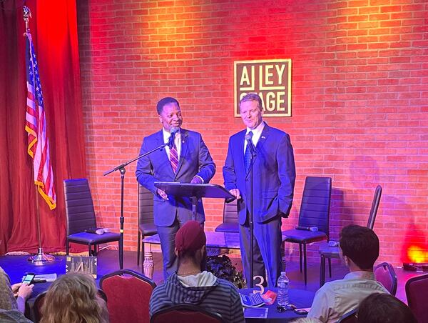 Jason Shepherd (right), the former Cobb GOP chairman, and Mableton Mayor Michael Owens (left), the former Cobb Democrats chairman, speak at the “Disagree Better” event in Marietta, a bipartisan group of current and former lawmakers addresses how to bring more civility to politics in Georgia and Washington. AJC/Greg Bluestein