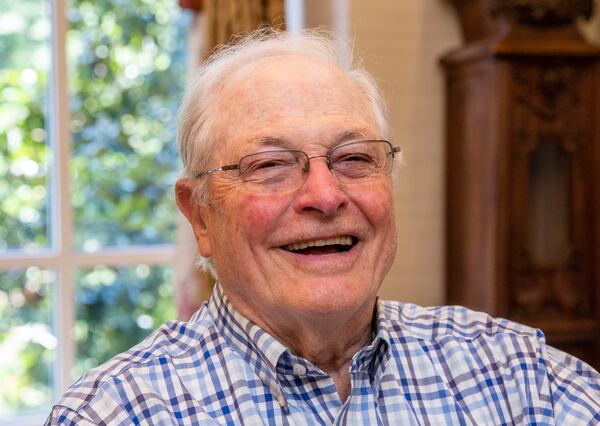 Howell Adams is a resident at Canterbury Court and takes an early lunch of tomato soup up to his residence Wednesday. (Jenni Girtman for The Atlanta Journal Constitution)