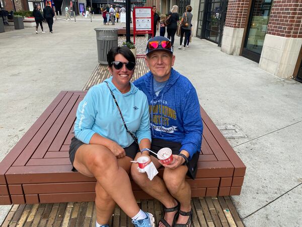 Chad and Paula Taylor are longtime Braves fan. Chad recalled leaving high school on a fall day back in 1995 to go the Braves parade celebrating their World Series win. Photo: Adrianne Murchison