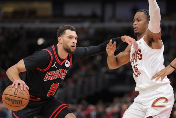 Cleveland Cavaliers forward Isaac Okoro guards Chicago Bulls guard Zach LaVine during an NBA basketball game, Monday, Nov. 11, 2024, in Chicago. (AP Photo/Melissa Tamez)