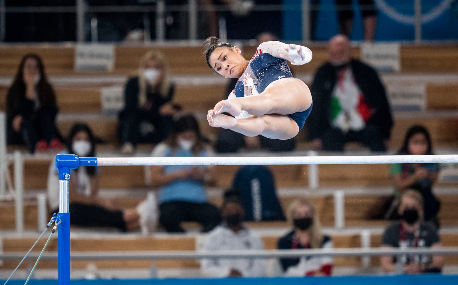 Sunisa Lee of the United States performs on the uneven bars during the women's all-around gymnastics competition at the postponed 2020 Tokyo Olympics in Tokyo on Thursday, July 29, 2021. (Doug Mills/The New York Times)