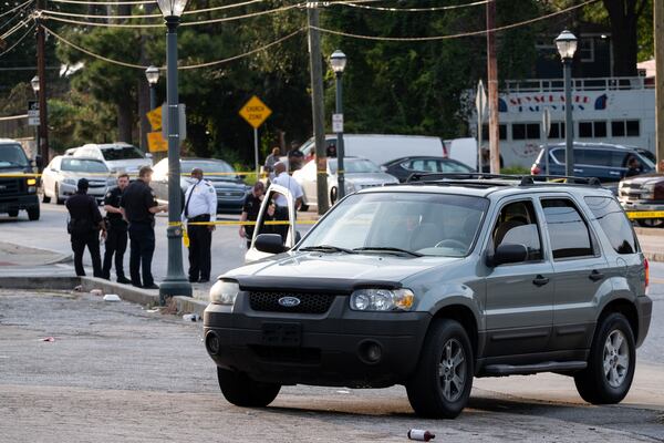 Multiple shotgun shells and handgun shells were scattered in the parking lot in front of the store.