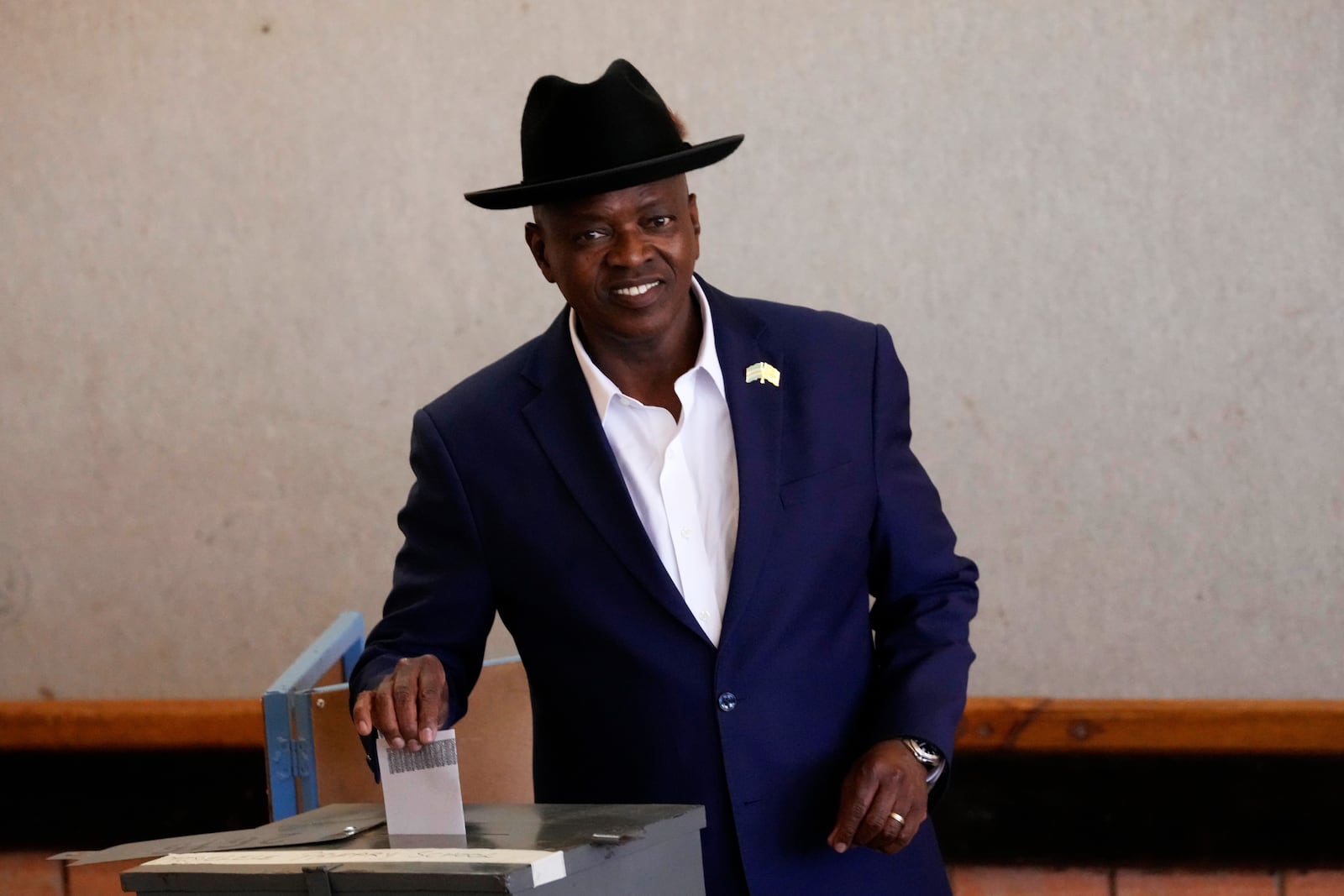 Botswana Democratic Party President Mokgweetsi Masisi casts his vote during an election to decide if it keeps faith with one of the Africa's longest-ruling parties, at a Mosielele primary school in Moshupa village, Southern District of Botswana, Wednesday, Oct. 30, 2024. (AP Photo/Themba Hadebe)