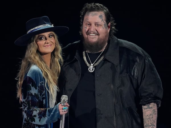 Lainey Wilson, left, and Jelly Roll perform "Save Me" at the 58th annual Academy of Country Music Awards on Thursday, May 11, 2023, at the Ford Center in Frisco, Texas. (AP Photo/Chris Pizzello)