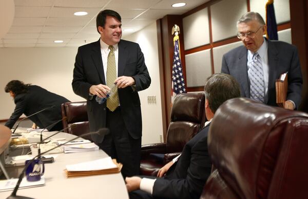 Chuck Eaton left, a member of the Public state Service Commission, with fellow member Doug Everett, right. AJC file