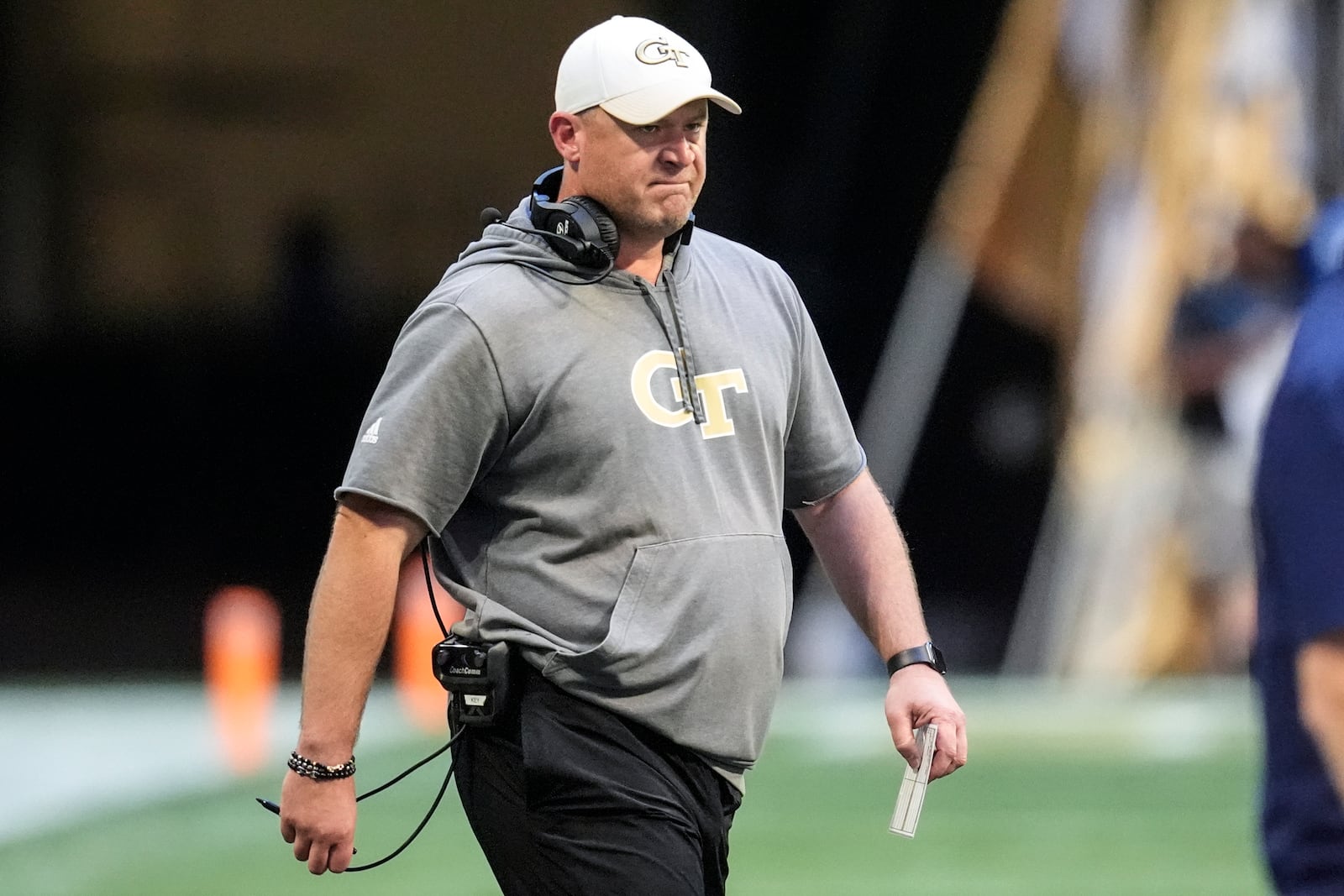 Georgia Tech head coach Brent Key ealks on the field during the first half of an NCAA college football game against Notre Dame, Saturday, Oct. 19, 2024, in Atlanta. (AP Photo/Mike Stewart)