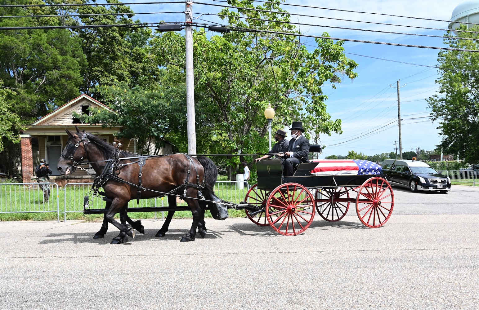 John Lewis crosses Edmund Pettus Bridge for final time