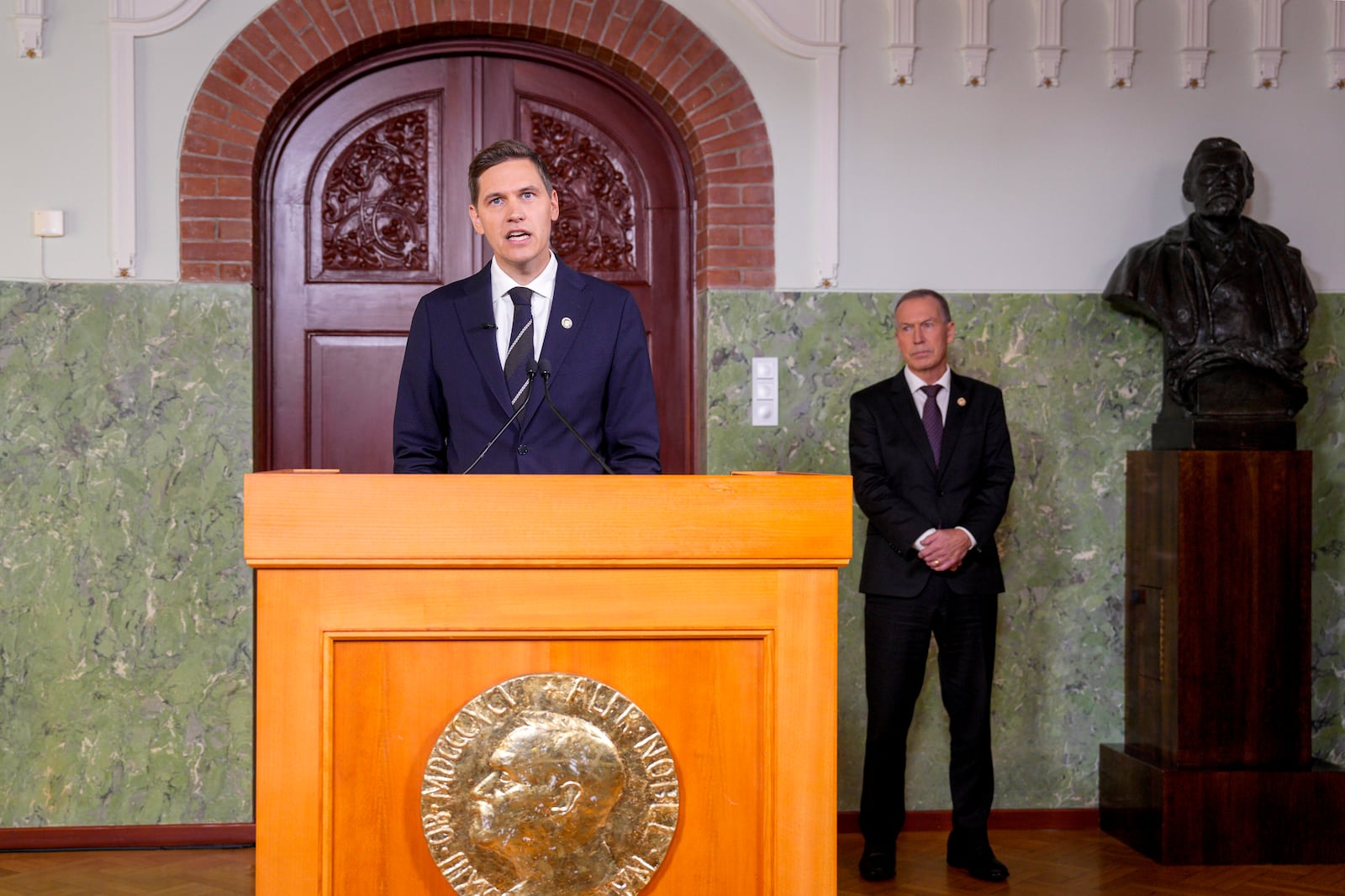 The head of the Nobel Committee, Jorgen Watne Frydnes, announces at a press conference that the Japanese organization Nihon Hidankyo is the winner of the Nobel Peace Prize for 2024 at the Nobel Institute in Oslo, Norway, Friday, Oct. 11, 2024. (Javad Parsa/NTB Scanpix via AP)