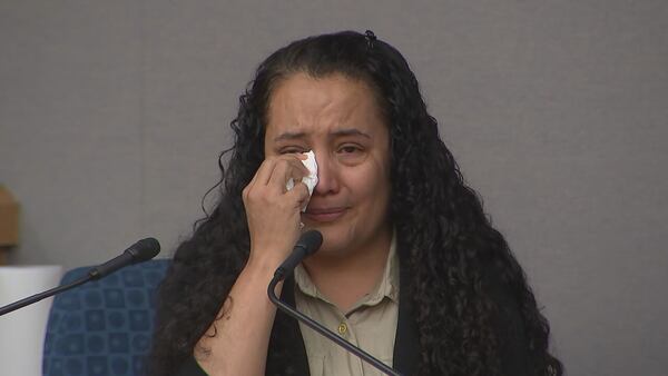 Maria Guadalupe Bran cries during testimony of the trial against former Doraville police officer Miles Bryant, who is charged with murder and kidnapping in the death of Bran's daughter, Susana Morales.