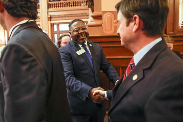 State Rep. Teddy Reese (center), a Democrat from Columbus, was first elected to the Georgia House in 2022.