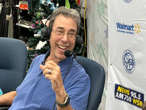 Clark Howard at the Roswell Walmart on Dec. 8, 2024 for the first of three in-person Clark's Christmas Kids events for individuals to purchase gifts for Georgia foster kids. RODNEY HO/rho@ajc.com