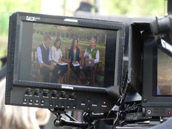 The cast through a camera. CREDIT: Rodney Ho/rho@ajc.com